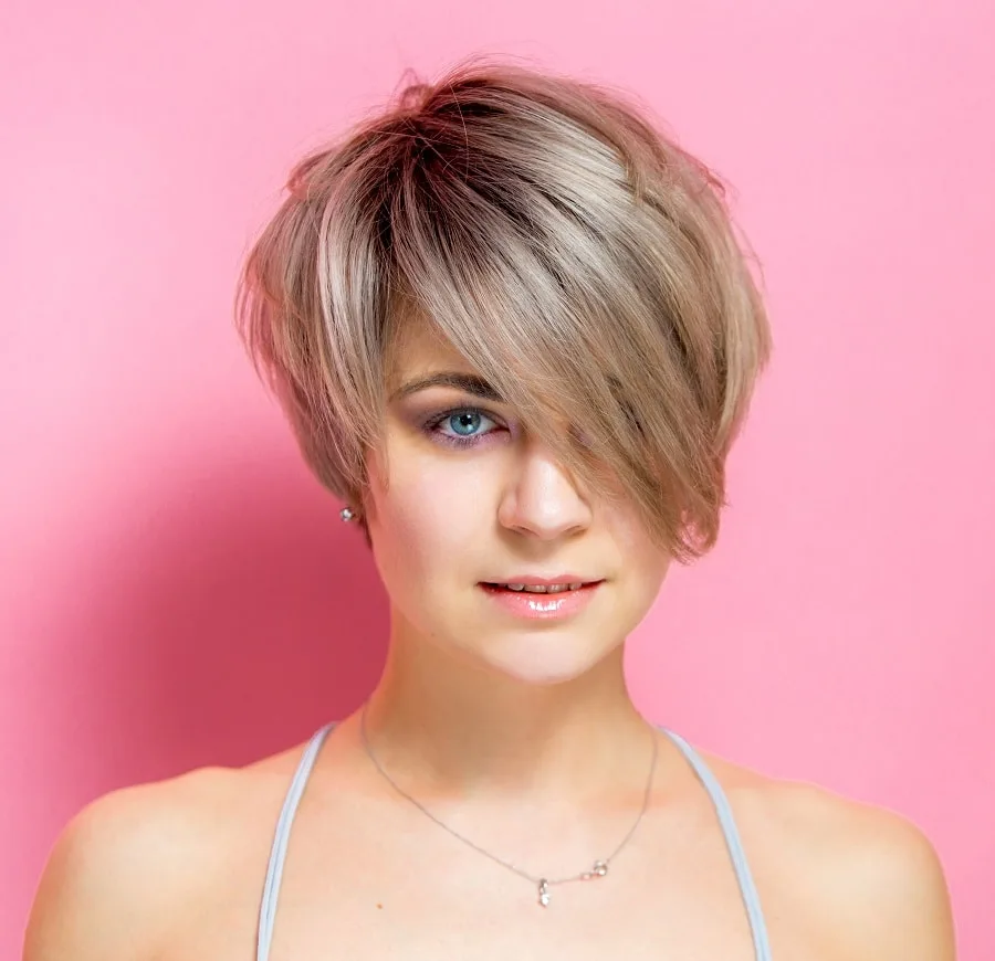 asymmetrical bob haircut for oval faces