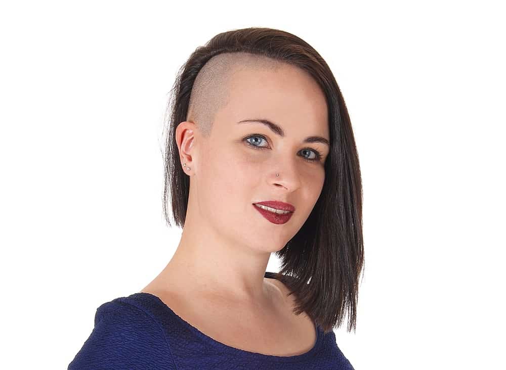 asymmetrical half shaved head hairstyle for women