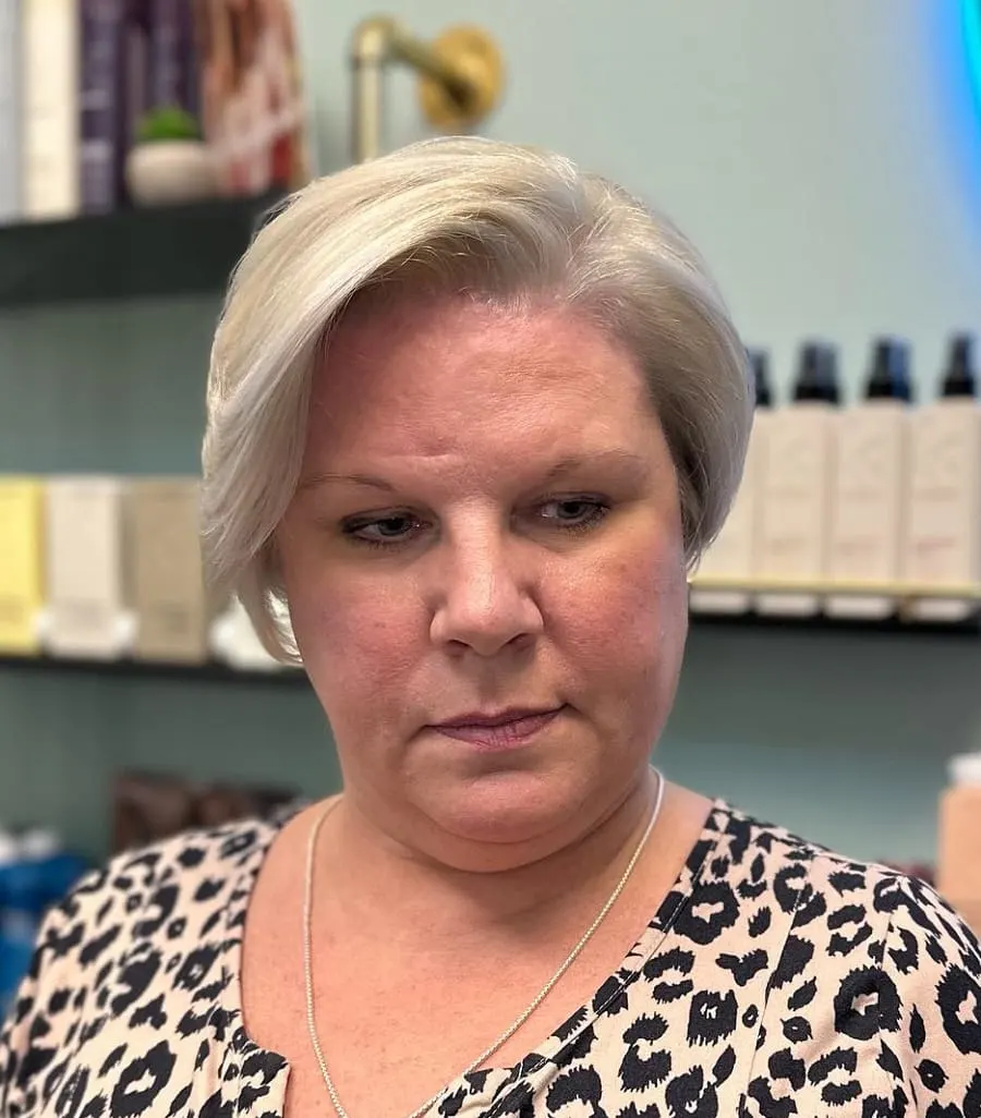 asymmetrical platinum hairstyle for over 50