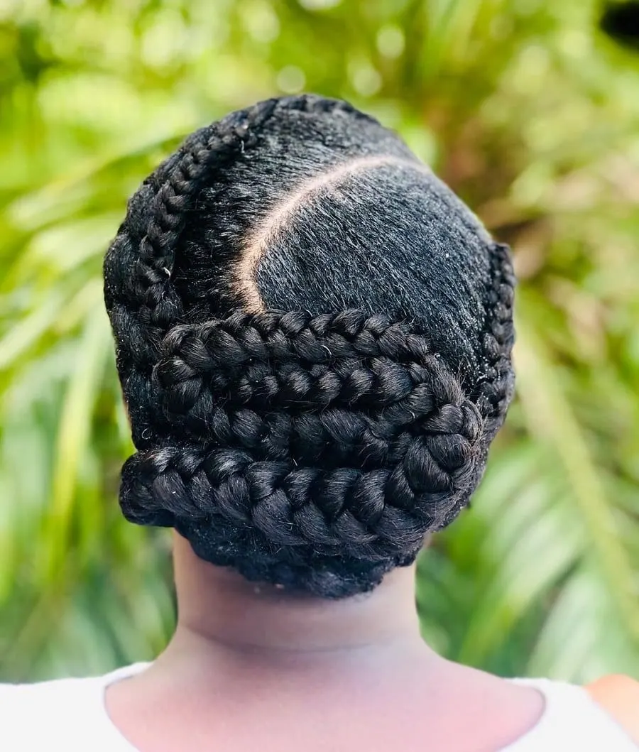 asymmetrical updo with two cornrows