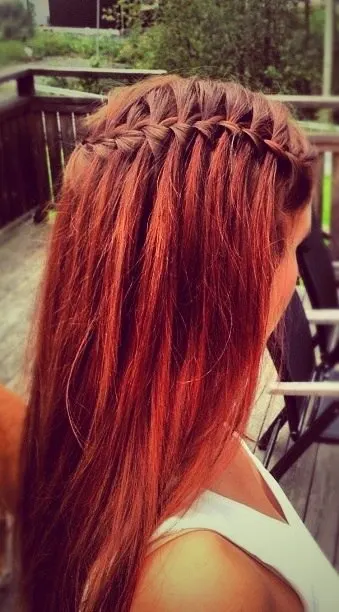 waterfall braid on auburn hair with highlights
