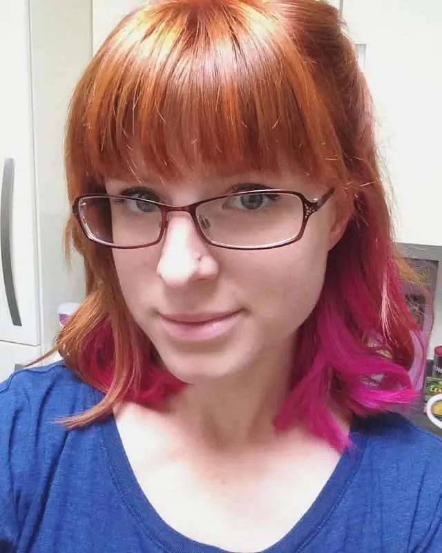 auburn red with pink hair 
