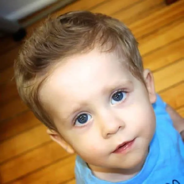 baby boy's first haircut with quiff