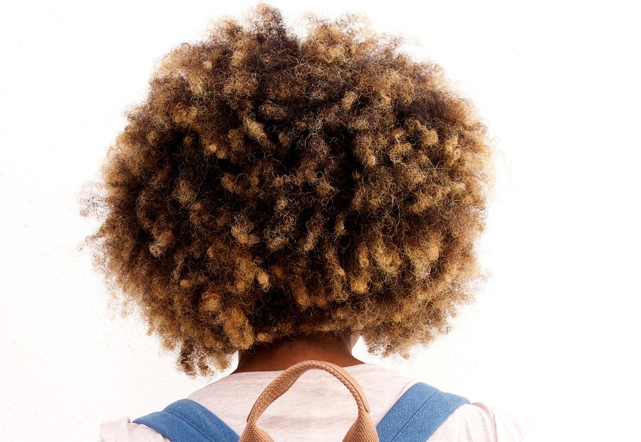 back view of short layered afro hair