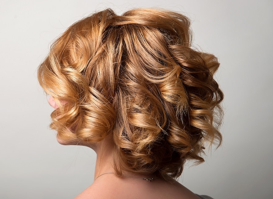 back view of short layered blonde curls
