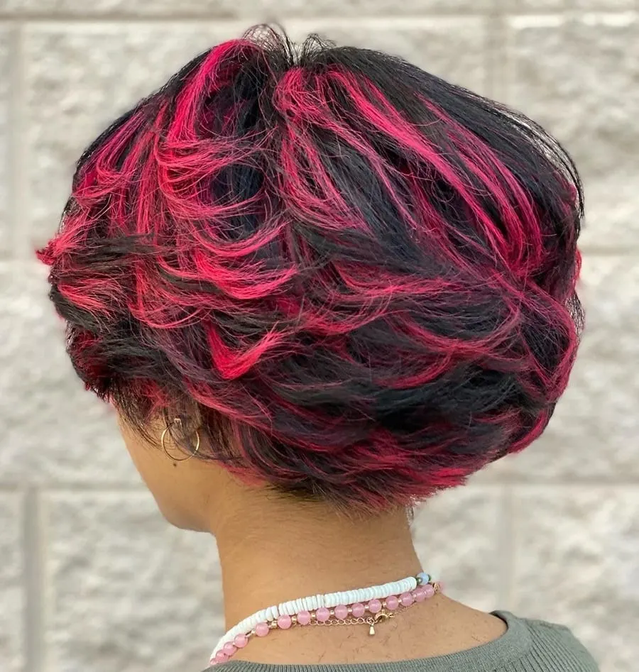 back view of short layered bob with pink highlights