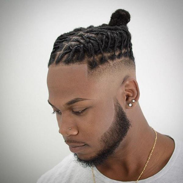 Side blad fade and Dreaded Braids with Beard