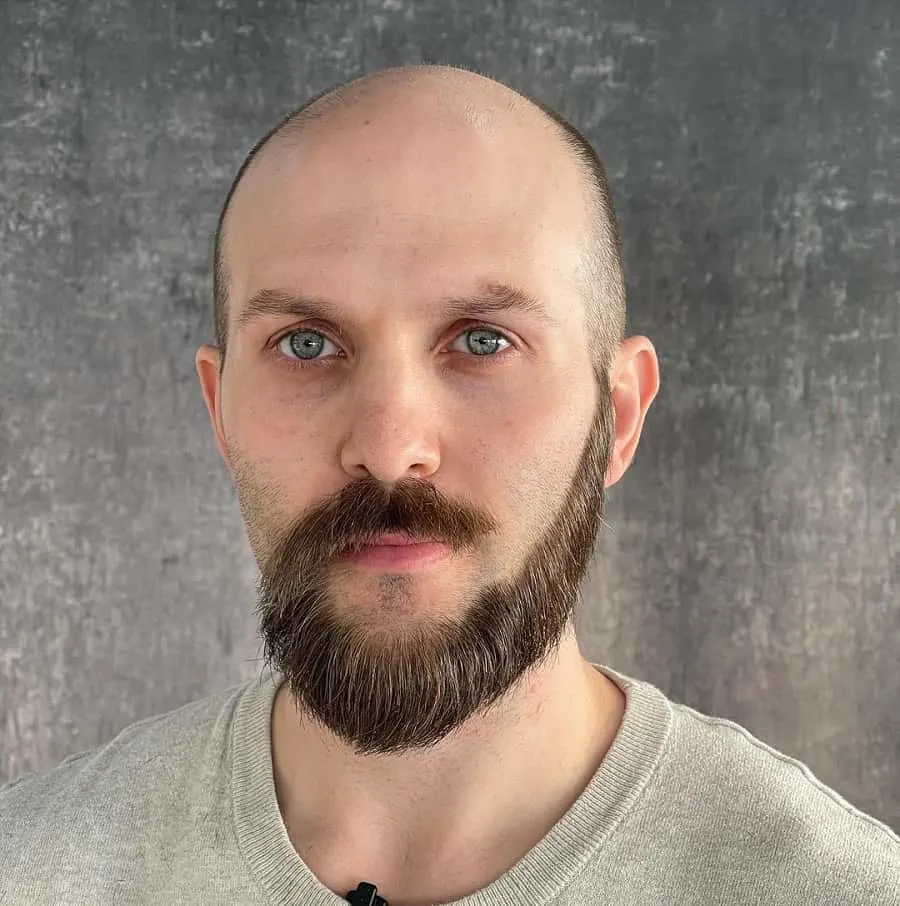 bald head with monkey tail beard