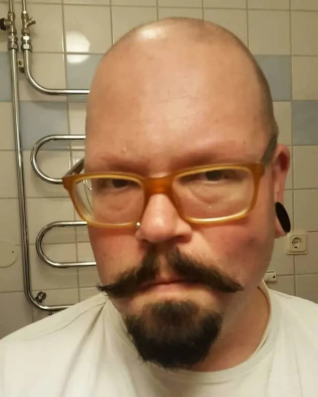 bald head with van dyke beard 