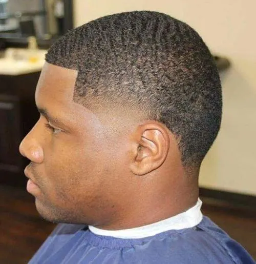 Bald taper fade with afro