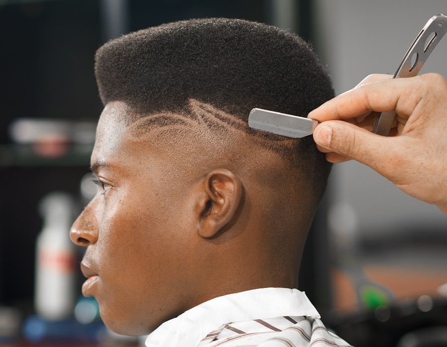 bald taper fade for afro hair with design