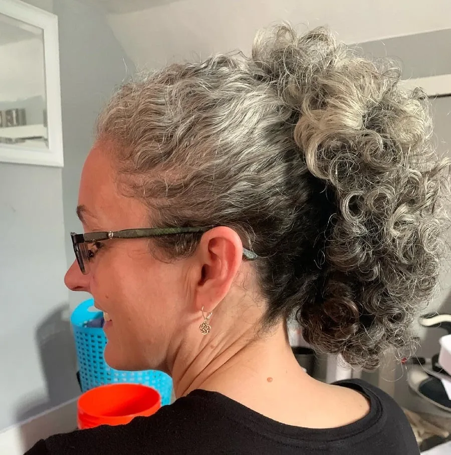 banana clip hairstyle with grey hair