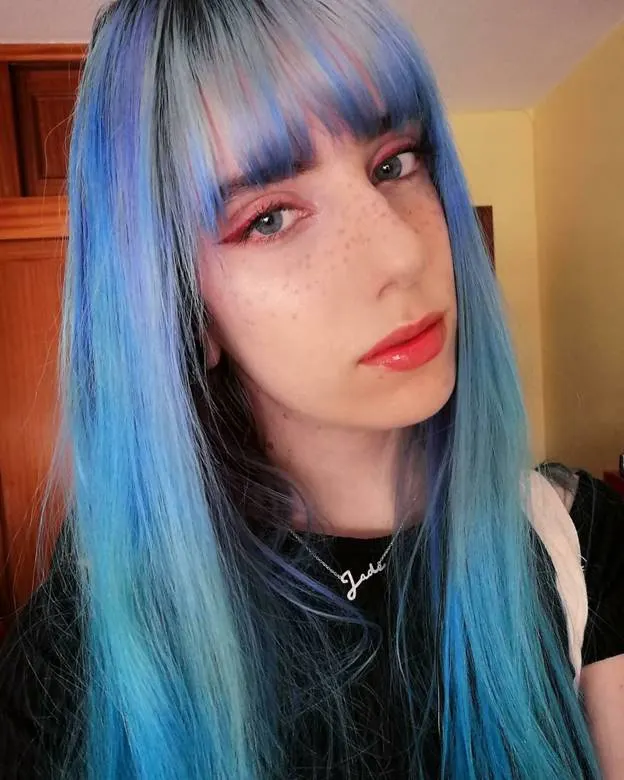 ash blonde bangs with blue highlights