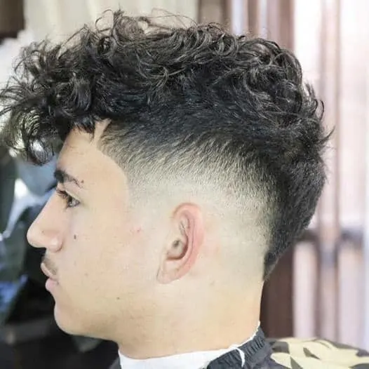baseball haircut with curly mohawk