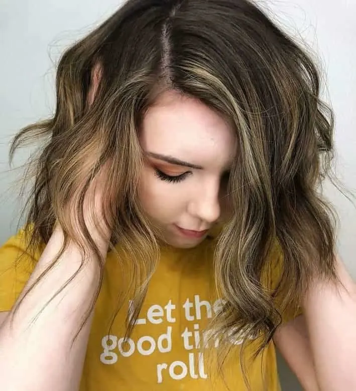 beach waves with babylights on medium hair