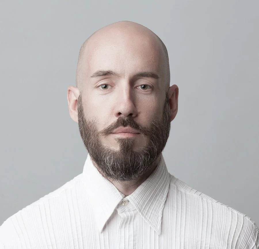 Image of Bald head with beard for oval face