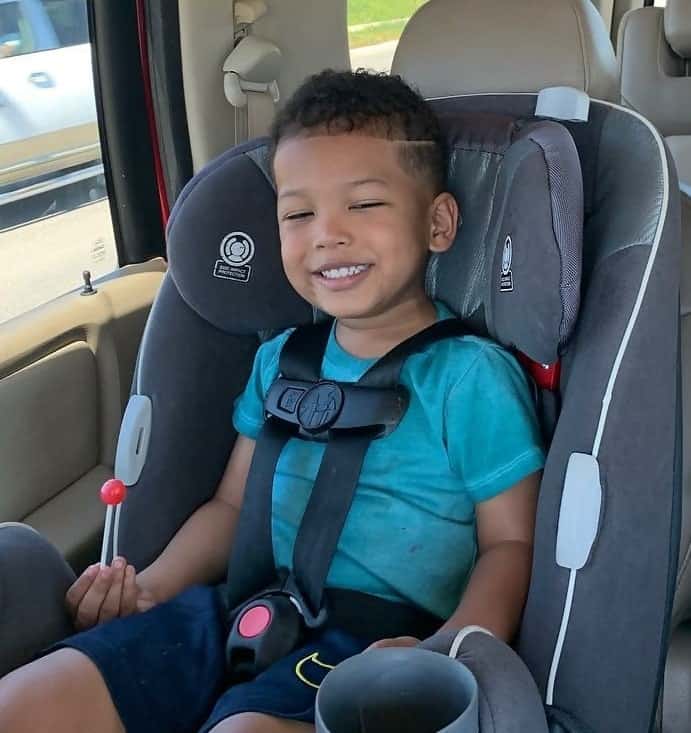 black baby boy with curly fade haircut