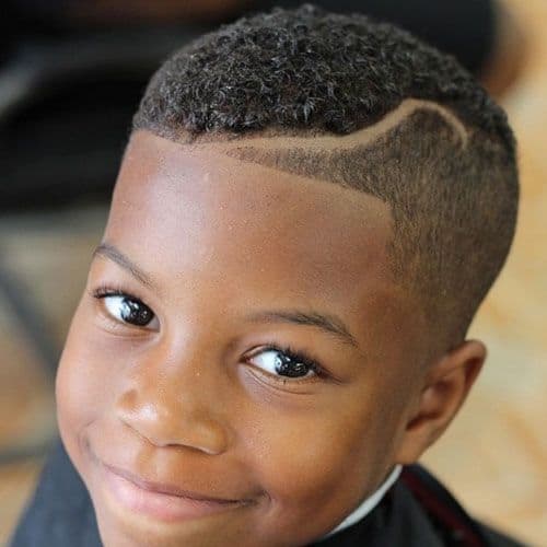 black boy's hairstyle with part fade