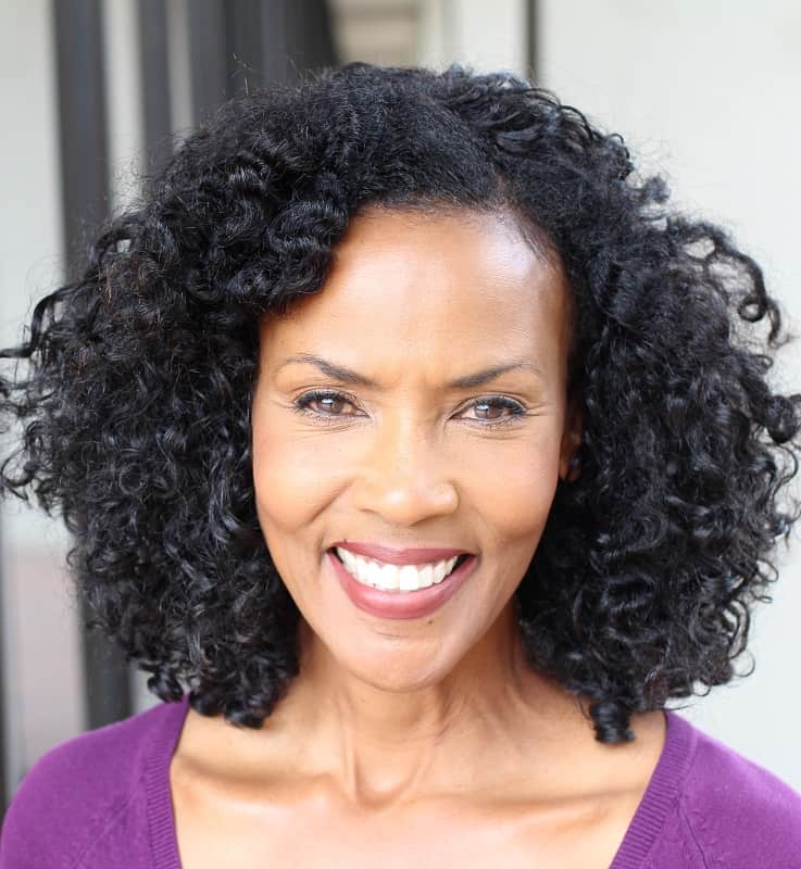 black curly hairstyle for women over 50