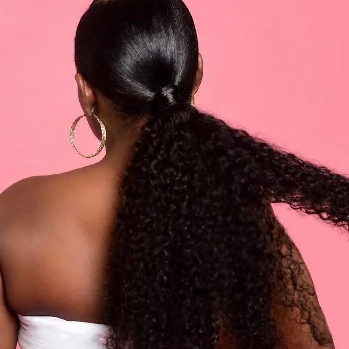 ponytail with black curly weave 