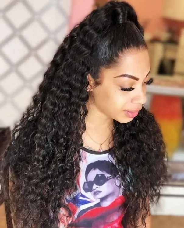 high ponytail with black curly weave