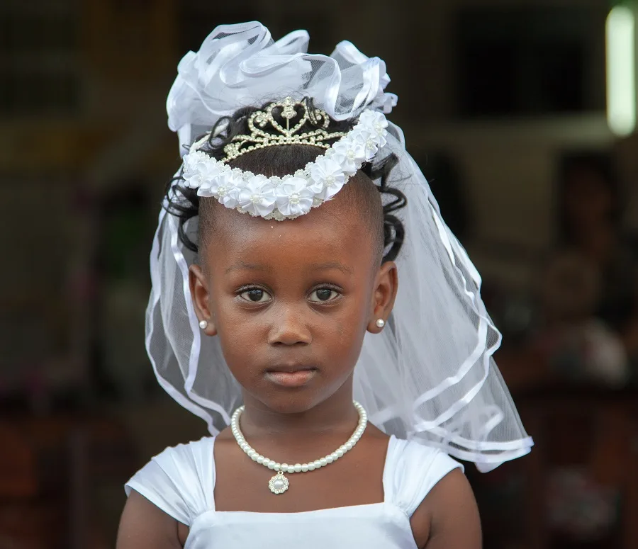 black flower girl hairstyle with tiara