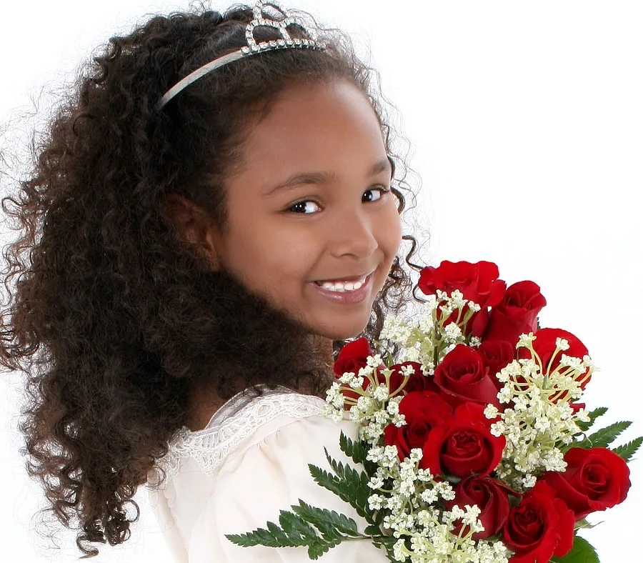 black flower girl with long curly hair