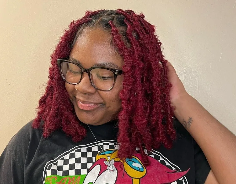 black girl with burgundy faux locs