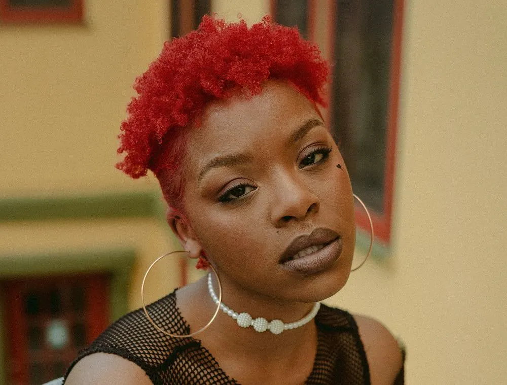 black girl's red undercut