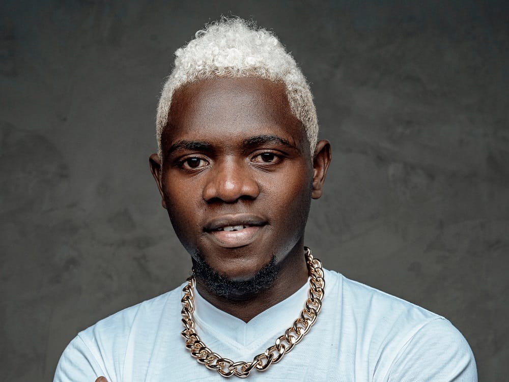 black guy with white hair
