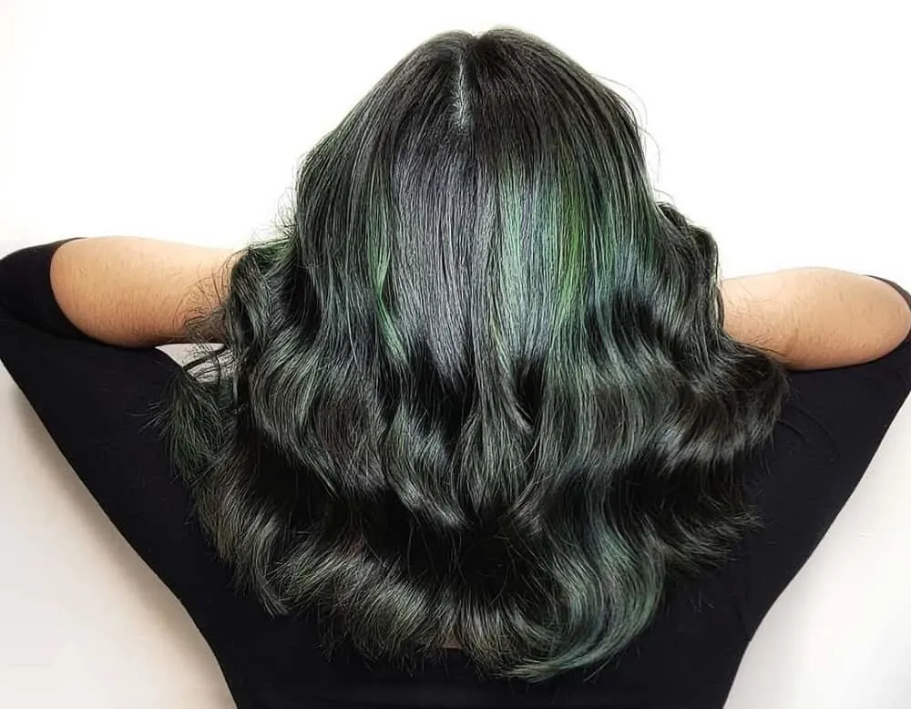 black hair with emerald highlights