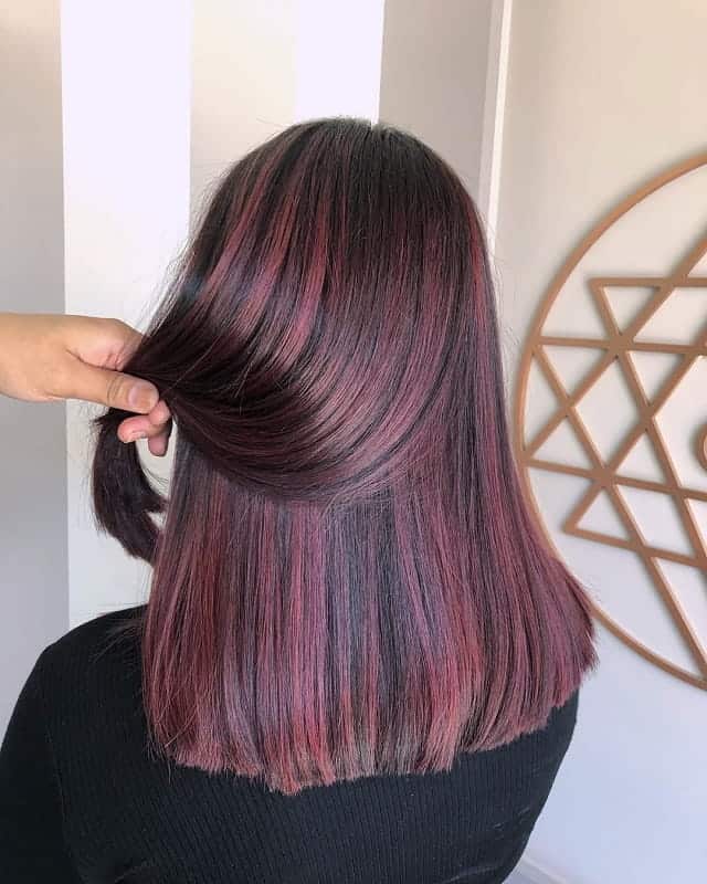 black blunt cut with red highlights