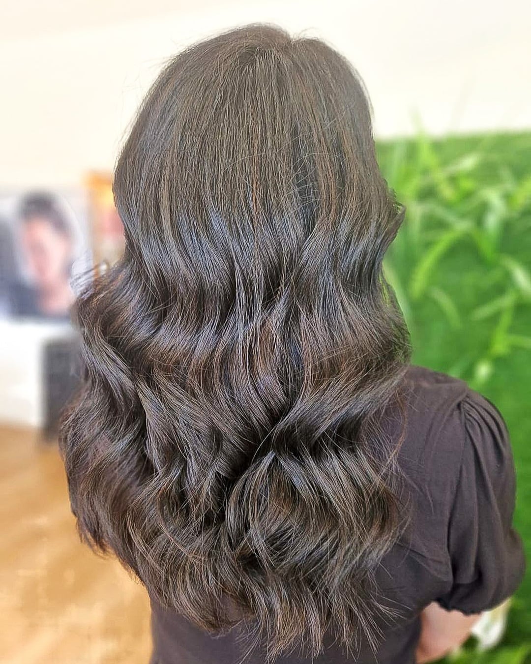 Black henna hair color on long wavy hair