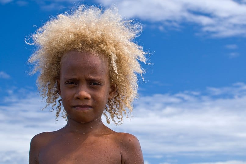 black kid with blonde afro hair