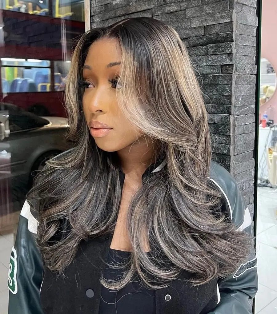 black layered hair with blonde highlights