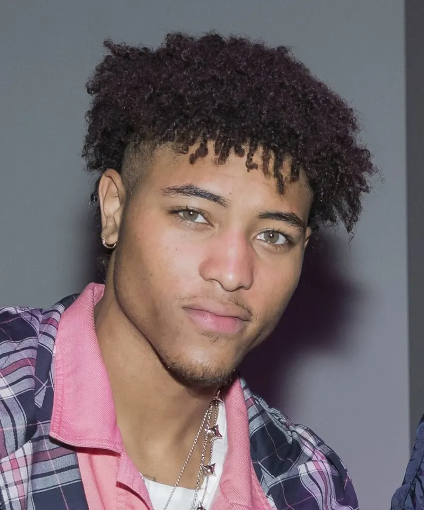 black male celebrity with curly hair-Kelly Oubre
