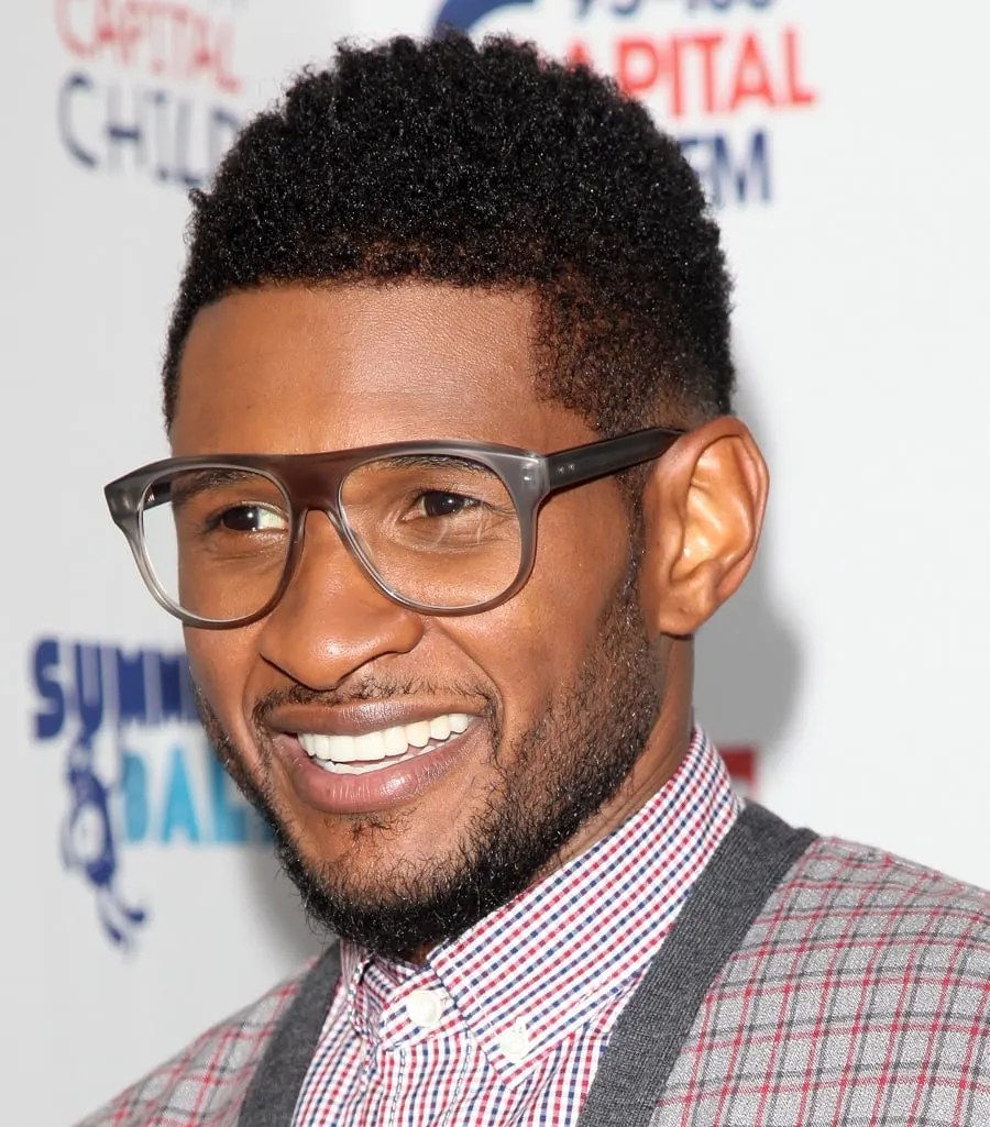 black male celebrity with curly hair-Usher