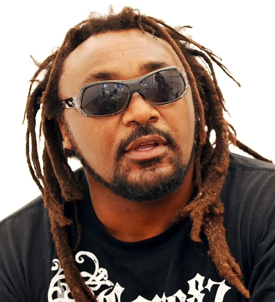 black male celebrity with dreads-Benji Webbe