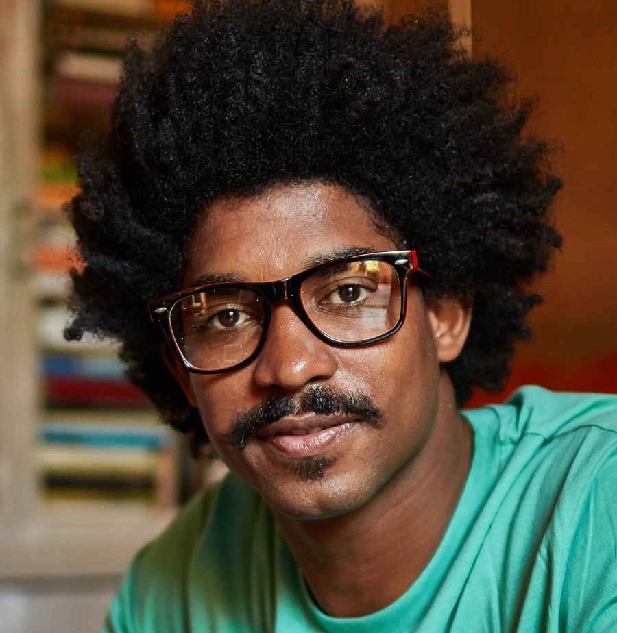 black man mustache with glasses