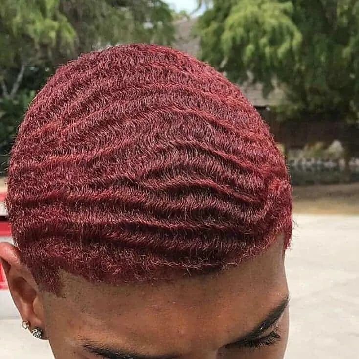 black guy with red wavy hair