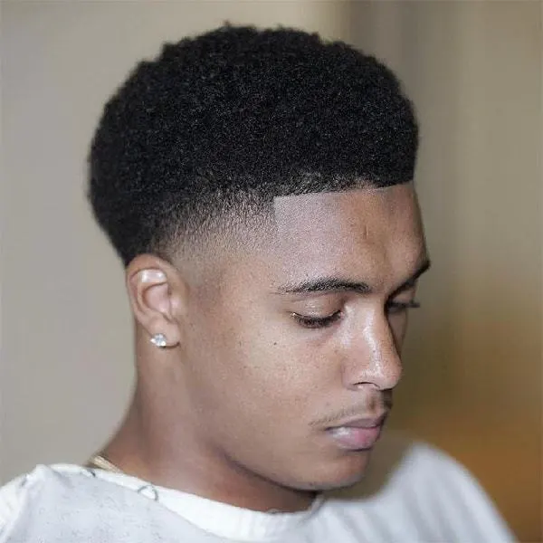 black men's short afro hairstyle