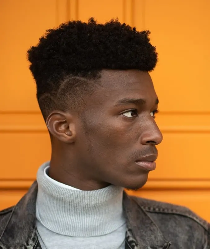 black men's short hairstyle with line