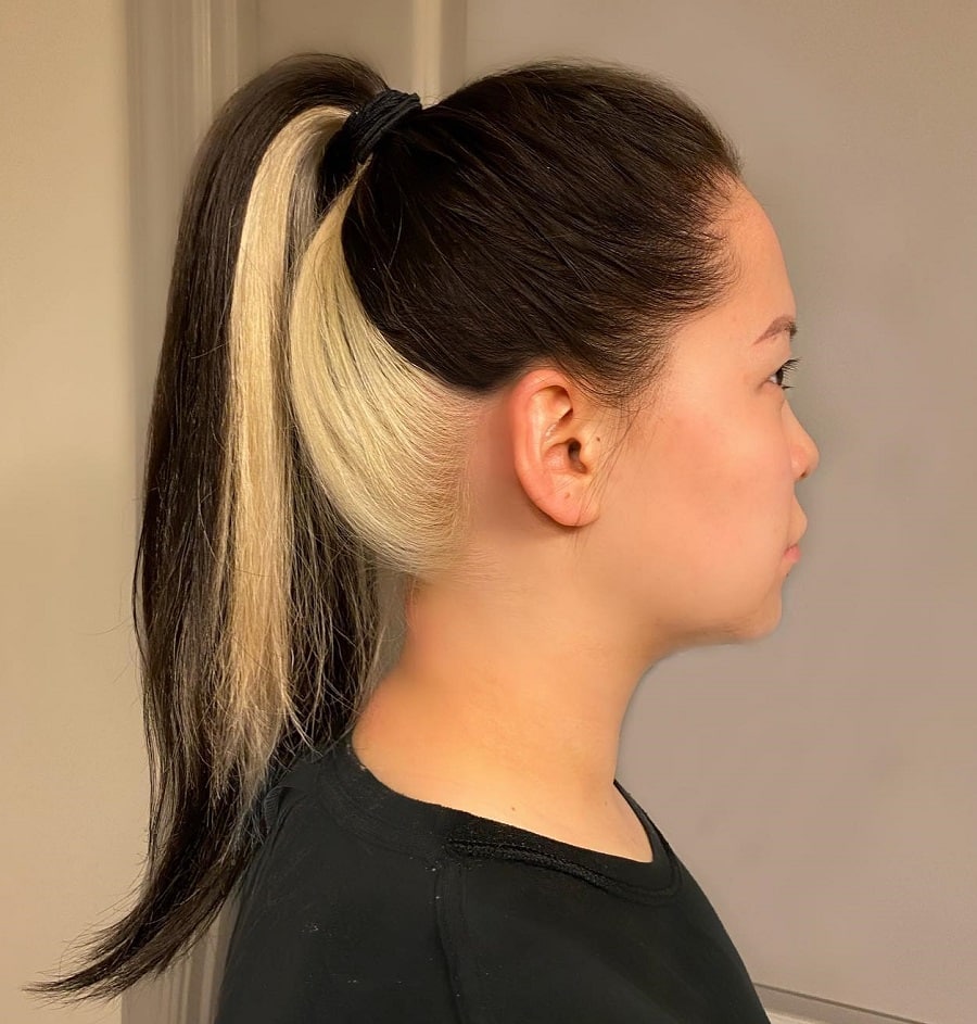 black ponytail with blonde underneath