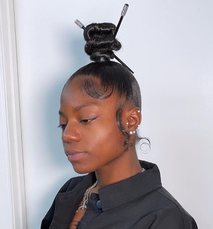 black topknot with hair stick