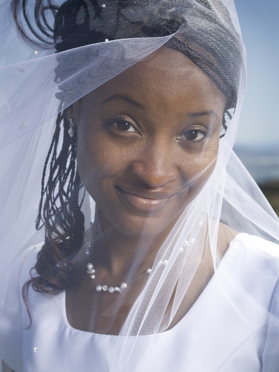 black wedding hairstyle with veil
