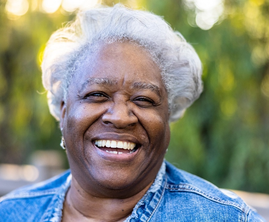 black woman over 60 with fluffy grey hair