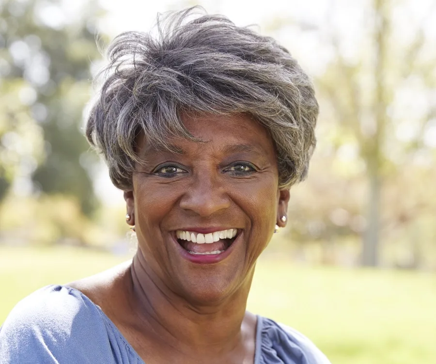 black woman over 60 with thick grey hair