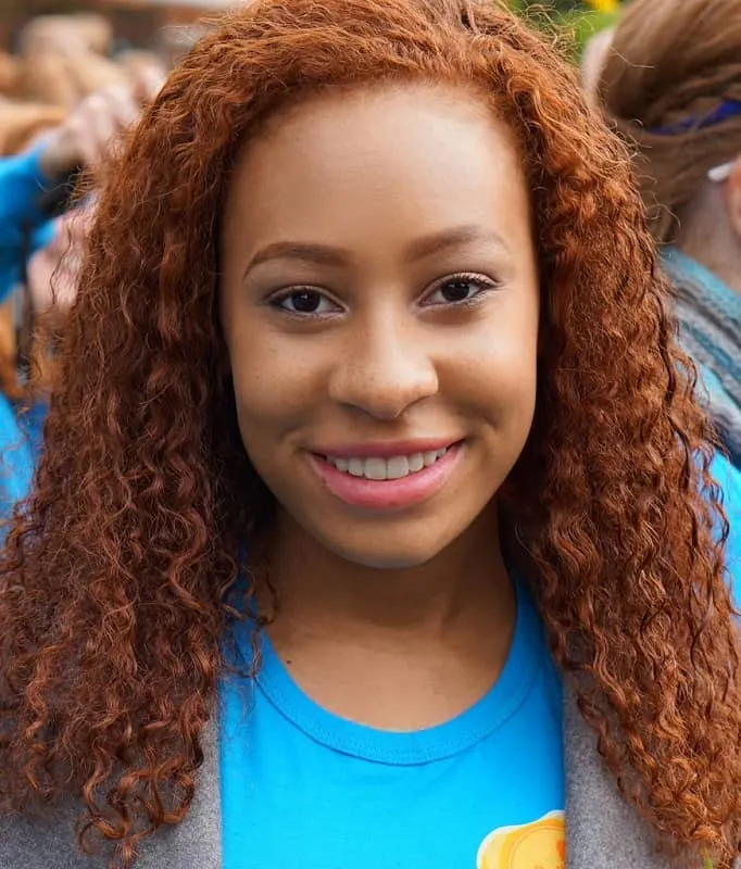 black woman with natural red hair 
