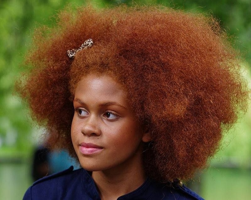 black woman with natural red hair 