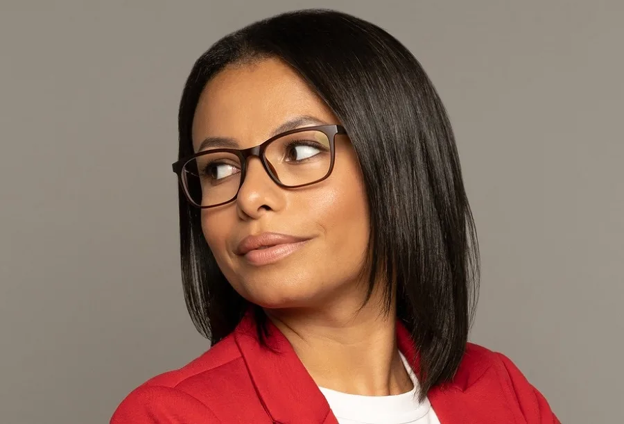 black woman with straight bob and glasses